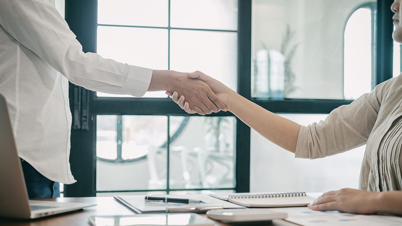 Business confident handshake and business people after discussing , success  concept