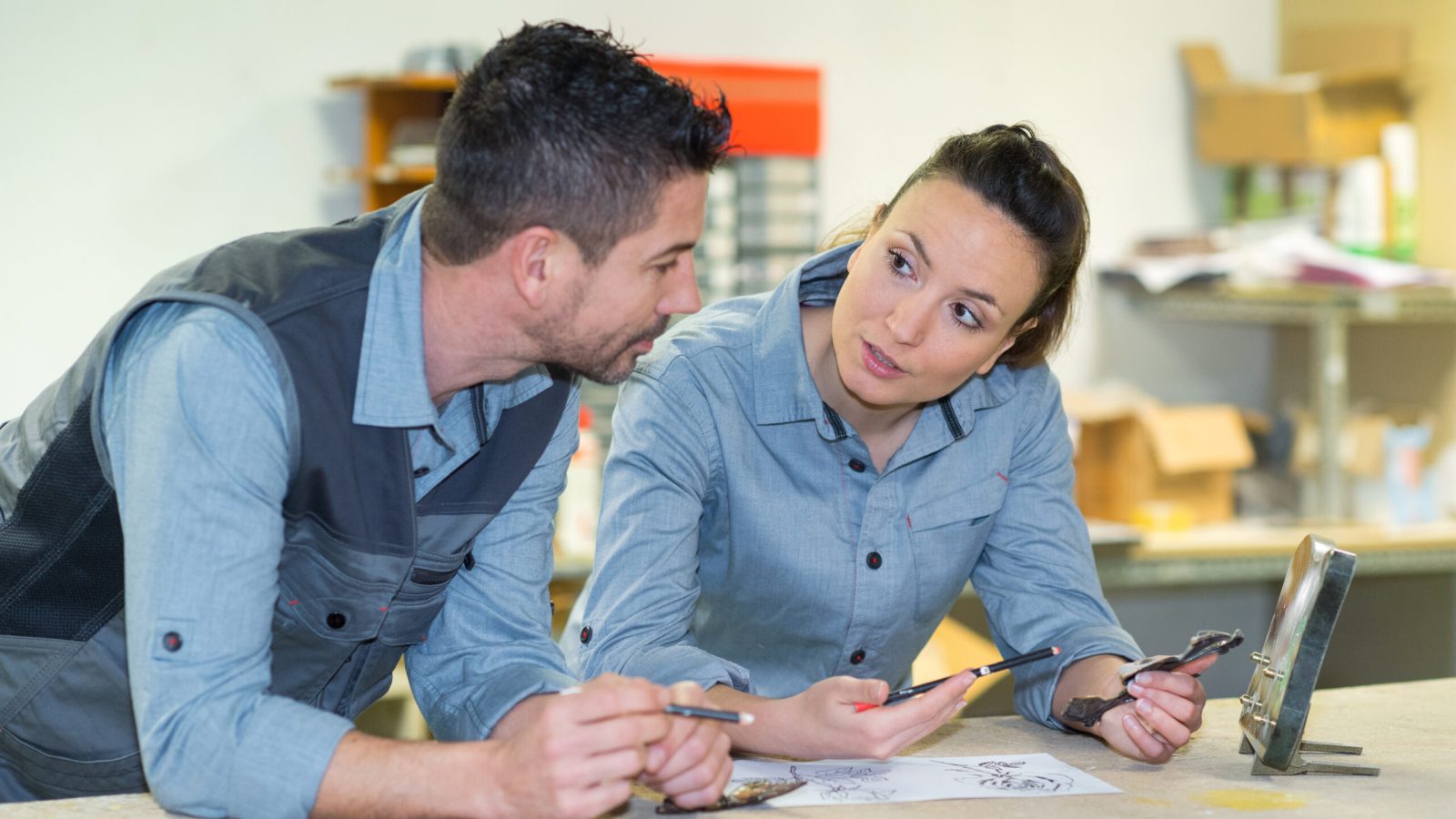 staff managing warehouse logistics in an on-site office